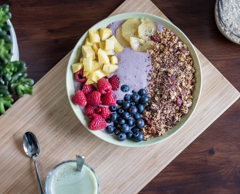 Photo of healthy smoothie bowl with fruits